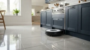 The best self-emptying robot vacuum mop efficiently scrubbing tiled kitchen floors
