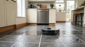A self-emptying robot vacuum mop demonstrating simultaneous vacuuming and floor mopping